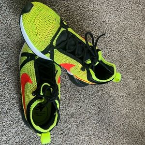 Womens Nike yellow/black with orange swooosh size 8.